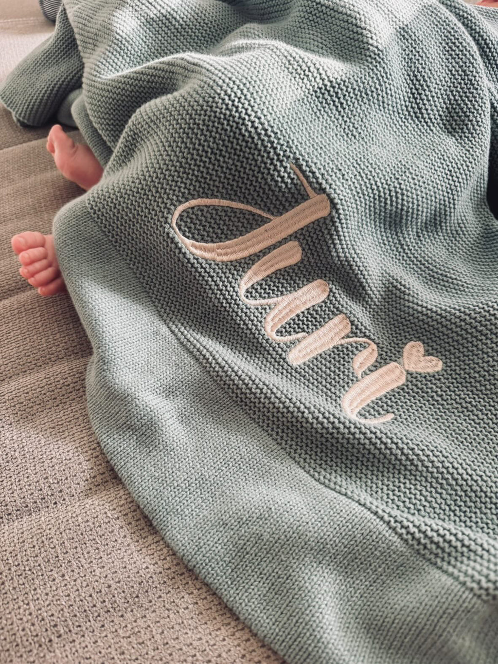 Baby-Strickdecke mit Bordüre | Türkis